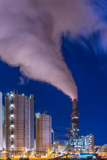 Power plant - energy industrie A big coal fired power plant. long exposure industry factory hamburg germany stock pictures, royalty-free photos & images