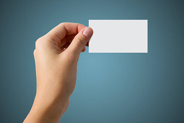 istock Hand holding white blank business visit card, gift, ticket, pass 506817264