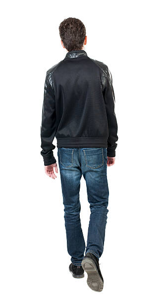 istock Back view of going  handsome man in jacket. 506820390