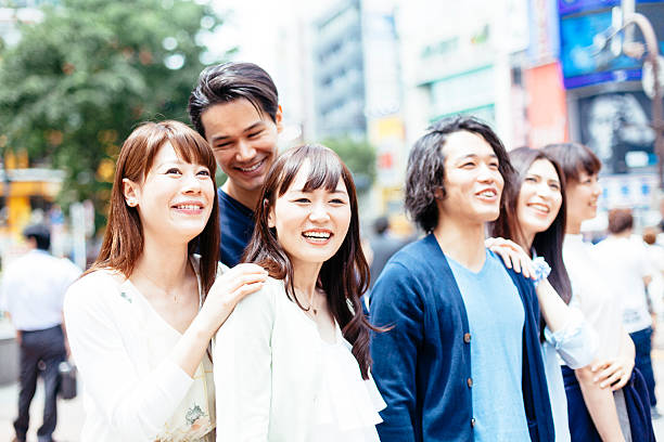 istock Young people  hanging out against cityscape 506820848