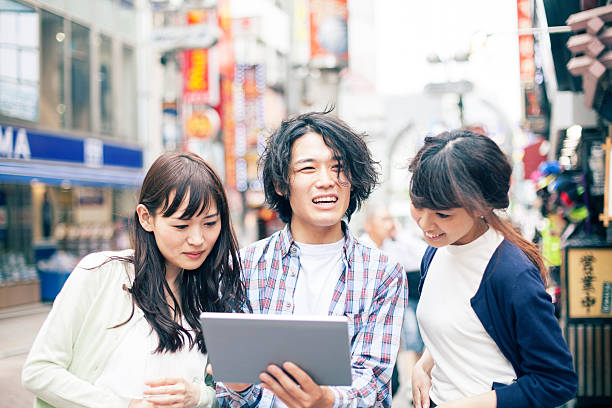 istock Young asian people taking selfie 506821072