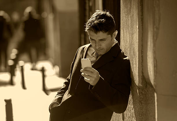 istock businessman using mobile phone sending message or consulting internet 506821154