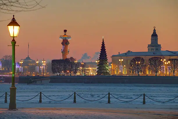 Spit of Vasilyevsky Island in St. Petersburg, Russia winter evening in Christmas decorations.