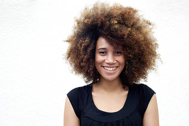 istock Young african american woman smiling 506821582