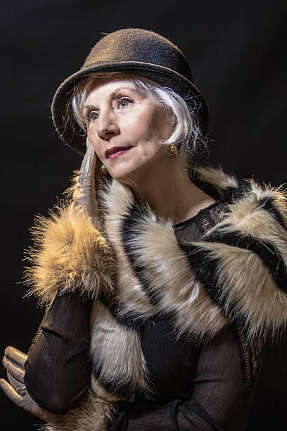 istock Gesturing Senior Adult Female 506823730
