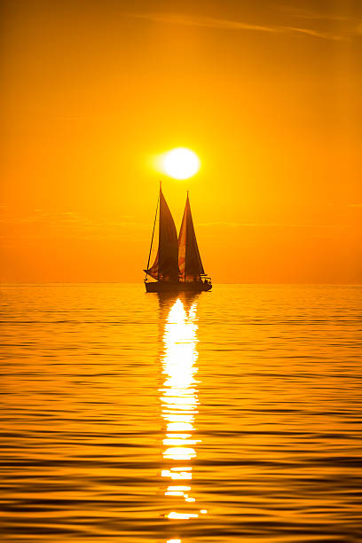 istock Sailboats formation at sunset 506825866