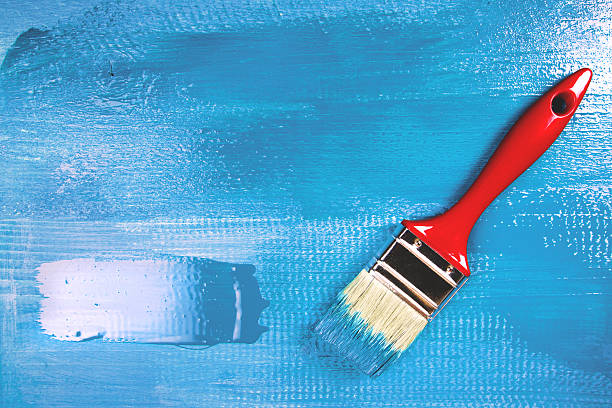 istock Painting  a wooden shelf using paintbrush 506827574
