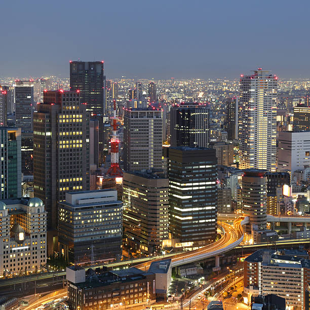 istock Osaka Japan skyline and traffic 506839001