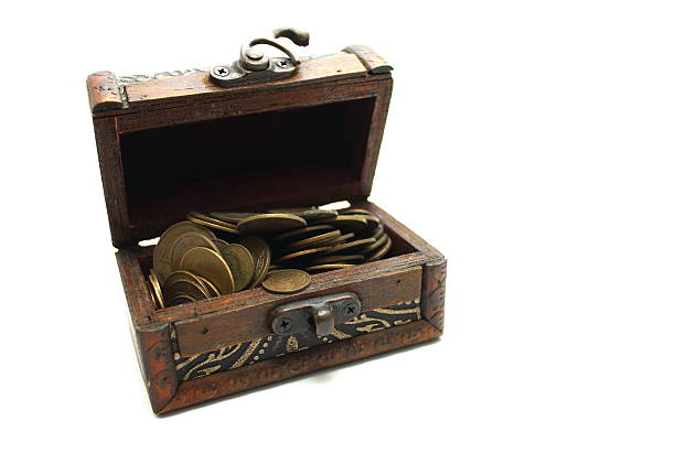 istock Open chest with old money on a white background 506840955