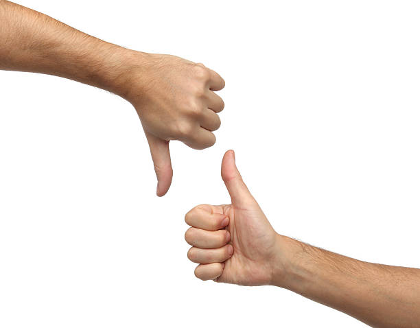 istock Hands signs. Thumb up and thumb down isolated on white 506841091