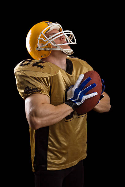 istock American football player posing 506843055