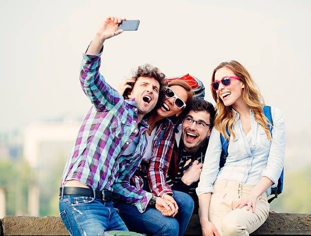 istock Cheerful Backpackers Making Selfie With Smart Phone. 506845387