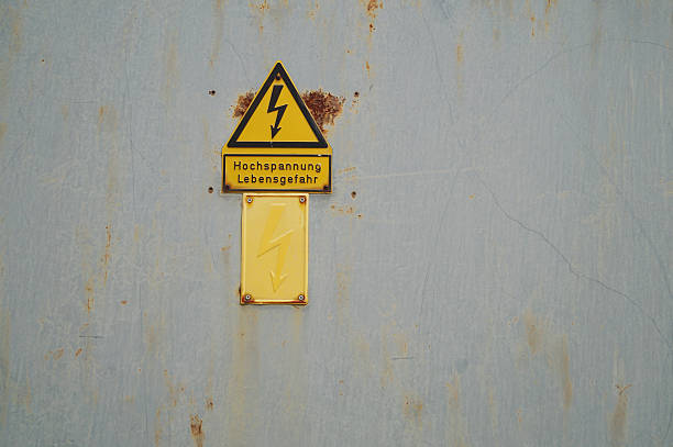 istock Sign of high voltage on a door 506846575