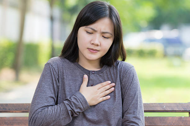 istock Woman: Chest pain at Park 506847354