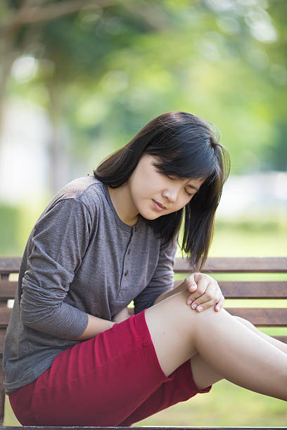 istock Woman Stomachache at Park 506848994