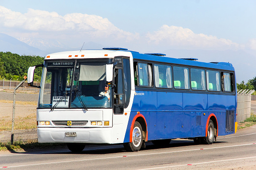 Santiago, Chile - November 24, 2015: Coach bus Busscar El Buss 340 drives at the interurban freeway.