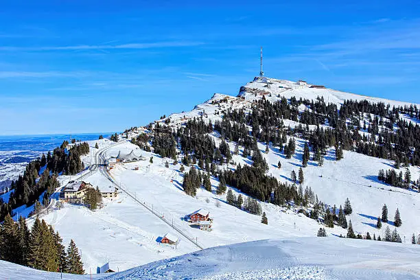 Top of Mount Rigi in winter. Mount Rigi, also known as Queen of the Mountains, is a mountain massif of the Alps, located in Central Switzerland.