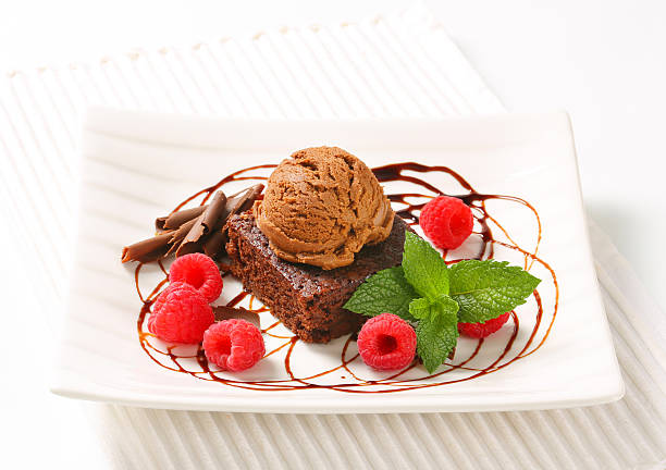 Chocolate Brownie with ice cream and raspberries