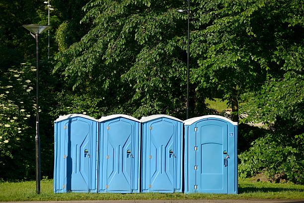 istock Old blue mobile toilet cabins 506852852