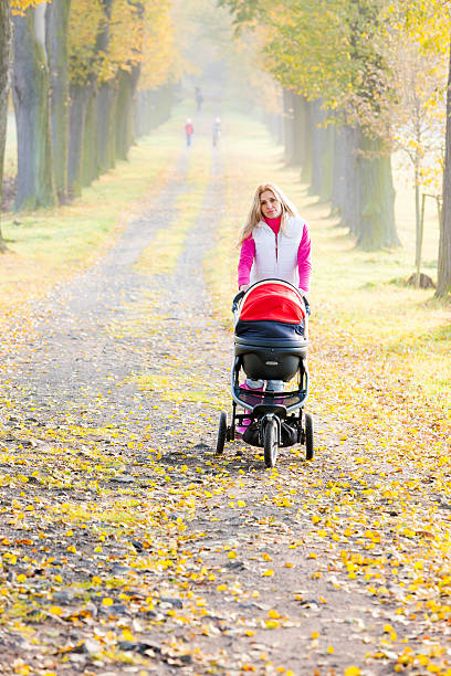 istock woman with a pram 506856864
