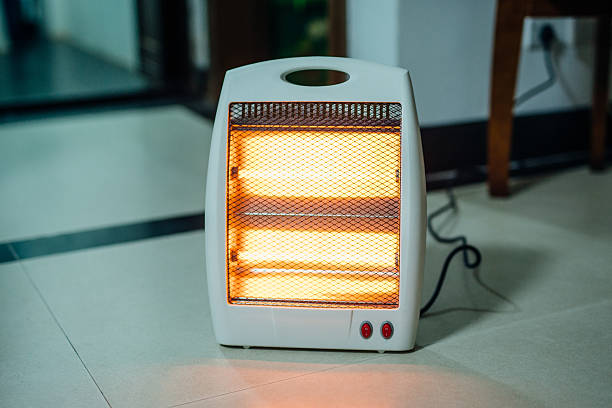 Electric heater Electric heater， used at home. electric heater photos stock pictures, royalty-free photos & images