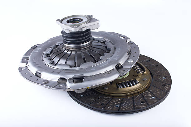 Clutch disc kit car on a white background Clutch disc, clutch cover and bearing for car on a white background purchase of steel scrap stock pictures, royalty-free photos & images