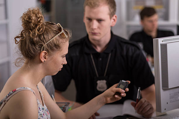 istock Young woman holding breathalyzer 506859216