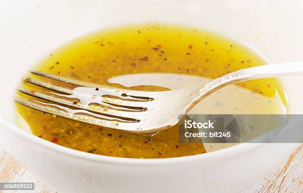 Salad Dressing In A White Bowl Stock Photo - Download Image Now - Close-up, Condiment, Cooking