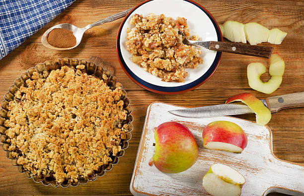 istock Apple Crumble Dessert on rustic wooden board. 506859846