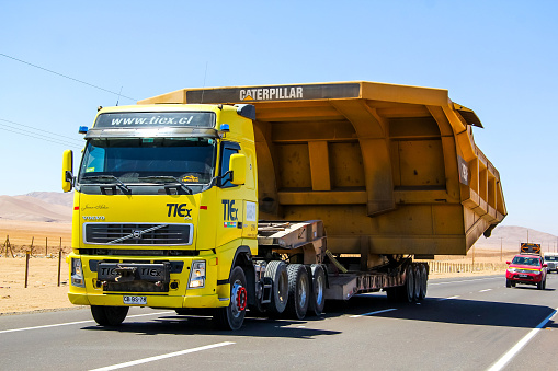 Atacama, Chile - November 18, 2015: Heavy trailer truck Volvo FH drives at the Pan-American Highway.
