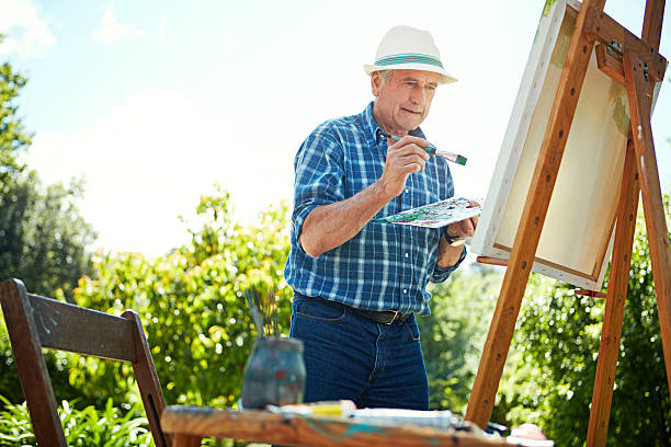 istock Painting makes him feel alive 506860544