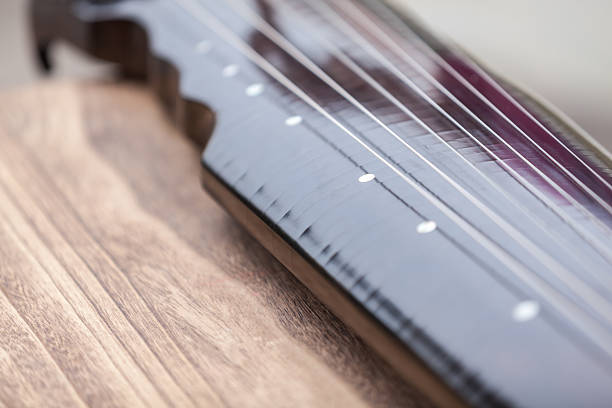 Close-up view of Chinese zither Close-up view of Chinese zither psaltery stock pictures, royalty-free photos & images