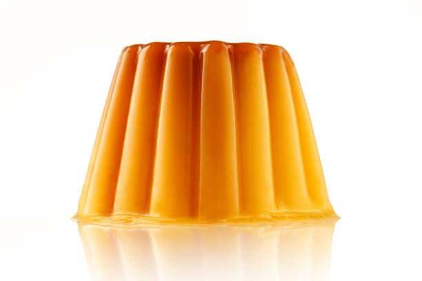 Delicious pudding or creme caramel isolated over white background
