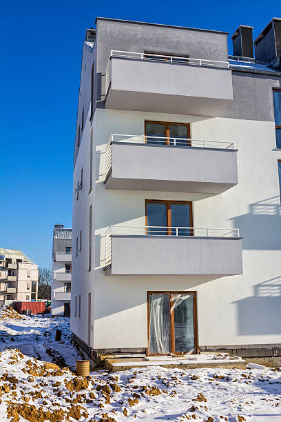istock New complex of apartment buildings under construction 506876178