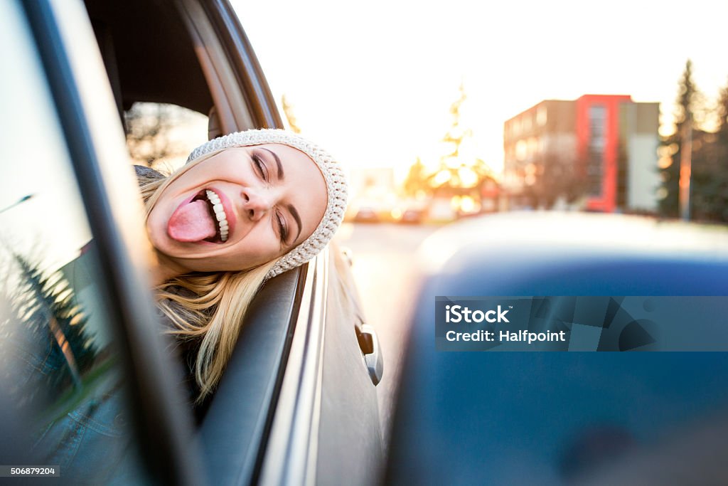 Woman driving a car Beautiful young blond woman driving a car Car Stock Photo