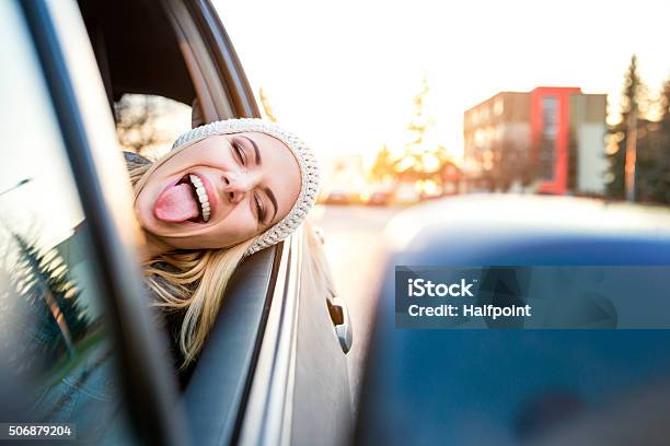 Woman Driving A Car Stock Photo - Download Image Now - Car, Making A Face, Women