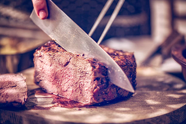 istock Perfectly Roasted Roast Beef Cut into Slices 506884516