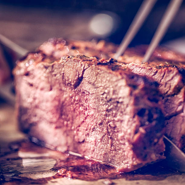 istock Perfectly Roasted Roast Beef Cut into Slices 506884576