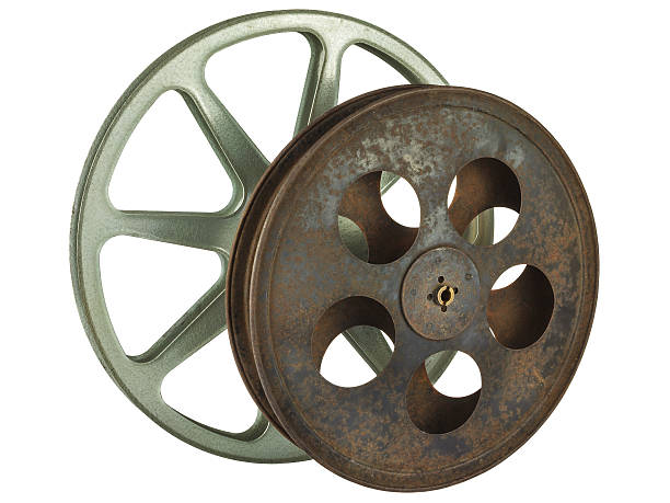 istock Two vintage film reels isolated on white 506885086