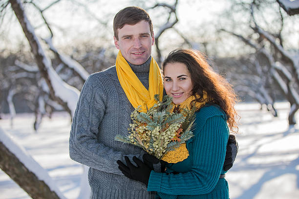 istock Young lovers having fun in winter clothes in the Park. 506888876