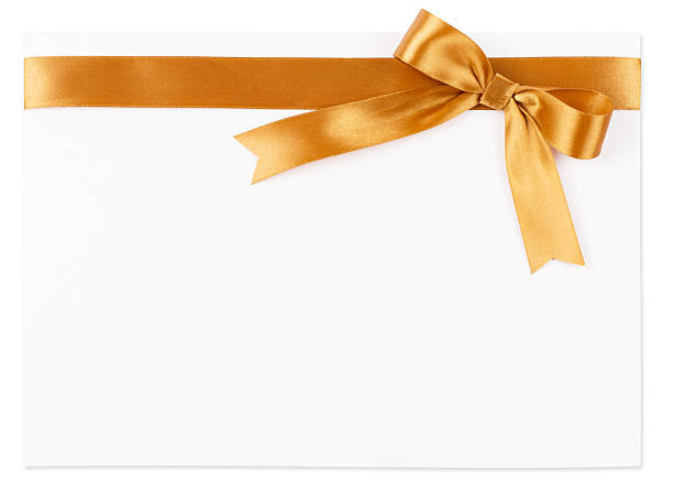 istock Gold bow on a satin ribbon 506889482