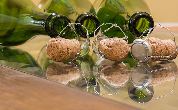 Champagne bottles, corks and wire stock photo