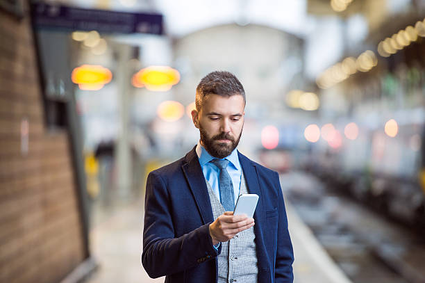 istock Businessman with smart phone 506891106