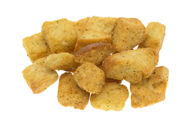 istock Large seasoned croutons on a white background 506892146