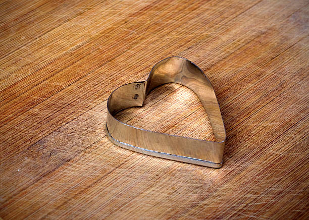 istock metal heart on grunge background 506892686