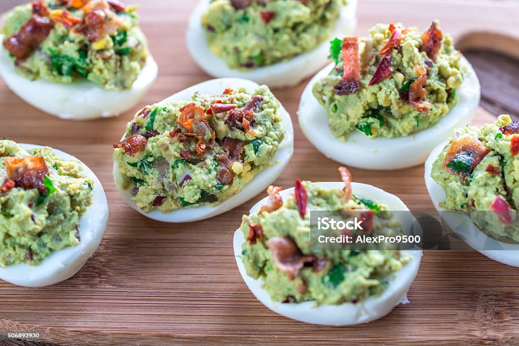 Bacon guacamole deviled eggs Egg - Food Stock Photo