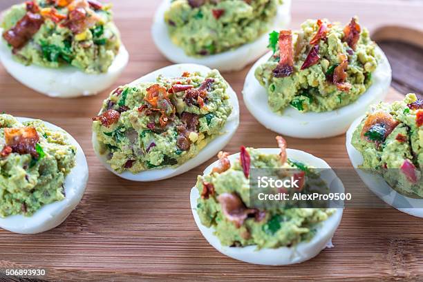 Bacon Guacamole Deviled Eggs Stock Photo - Download Image Now - Egg - Food, Guacamole, Appetizer