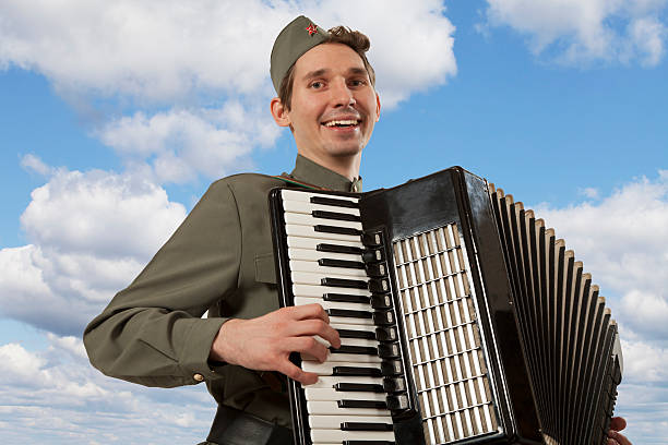 istock Soviet soldier playing the accordion 506895066