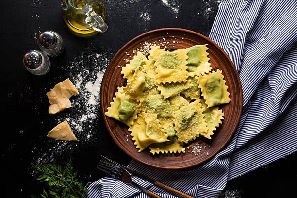 ravioli with spinach and ricotta cheese. Parmesan. in a plate ravioli with spinach and ricotta cheese. Parmesan. in a plate ricotta photos stock pictures, royalty-free photos & images