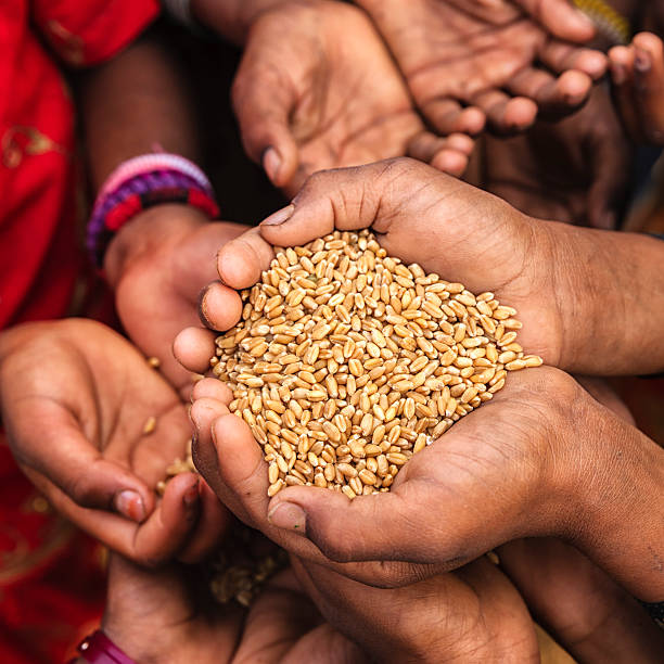 istock Hands of poor - asking for food, Africa 506895426